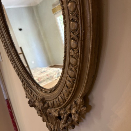 Baroque oval wall mirror with carved plaster frame, used, 104×61 cm