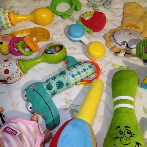 Baby rattles and toys used, set of multiple pieces