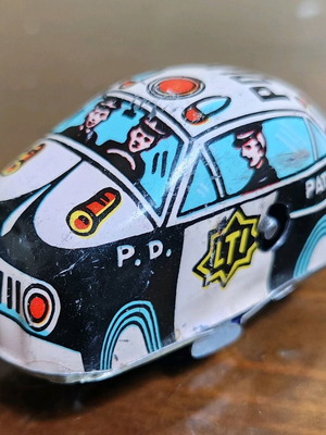 Metal wind-up police car Lucky Toy used (1999)