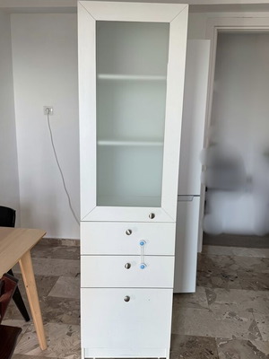 Wardrobe shelf used with three drawers and glass shelves