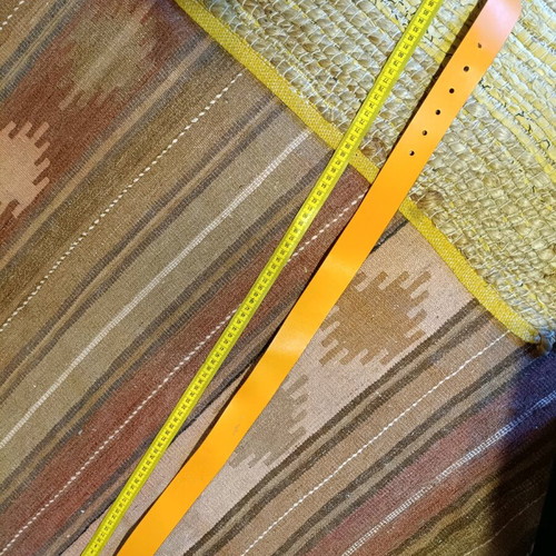 Three Benetton belts used, two leather and one fabric