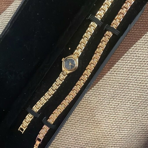 Cristian Delon women's watch and bracelet set used, gold-tone
