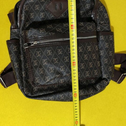 Soho backpack like new, brown with logo and 2 zipper compartments