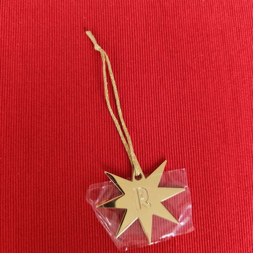 Paco Rabanne phone charm new, in original package