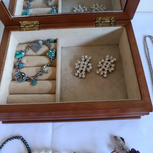 Vintage wooden jewelry box with jewelry used