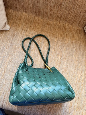 Woven green pouch bag