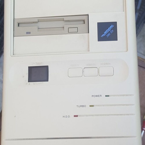 Retro AT computer case with 5.25 floppy drive and power supply used