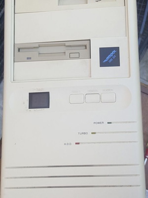 Retro AT computer case with 5.25 floppy drive and power supply used