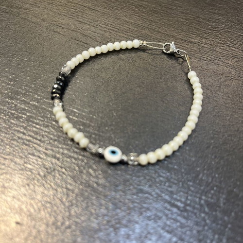 Handmade bracelet with beads, stainless steel clasp, like new, white