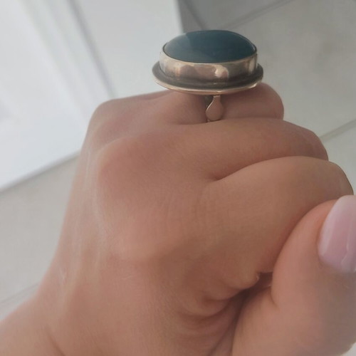 Silver large ring with petrol oval stone used