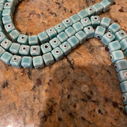 Enamelled ceramic evil eye beads new, pack of 100, turquoise