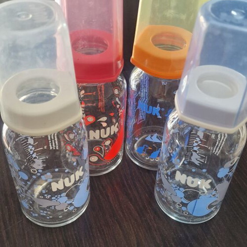 4 glass NUK baby bottles without nipples