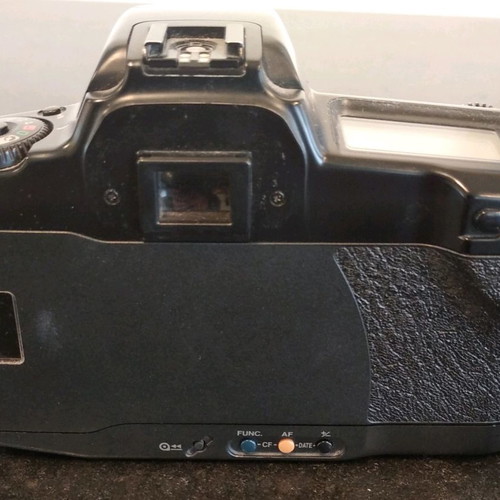 Canon EOS 10QD camera used with 38-76mm telephoto lens
