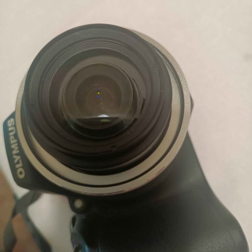 Olympus SP590UZ digital camera used, 26x zoom, retro style