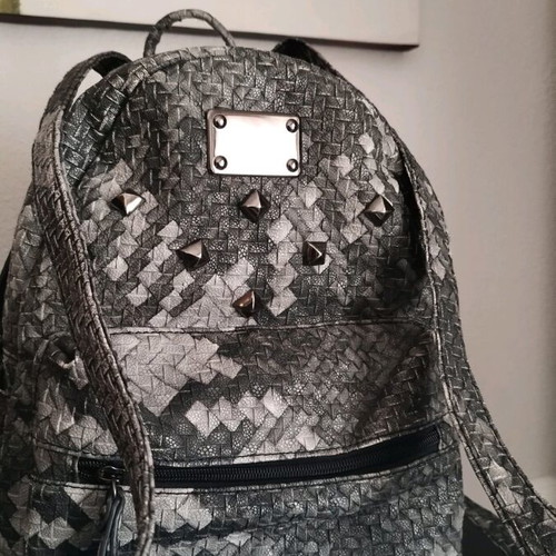 Grey backpack like new with studs