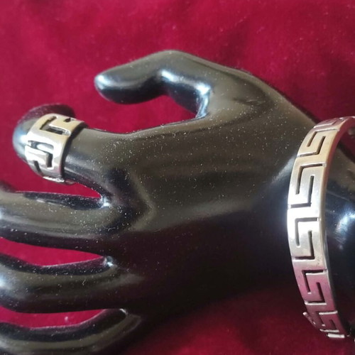 Silver 925 bracelet and ring set like new with meander design