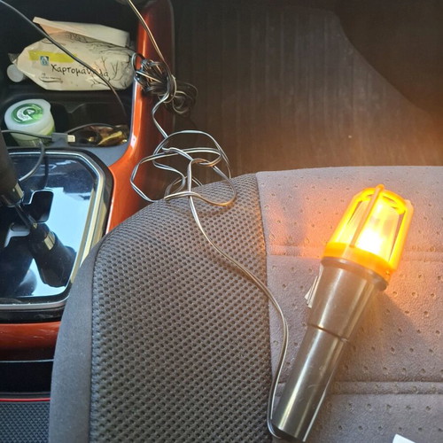 Car flashlight like new with long cable and hook