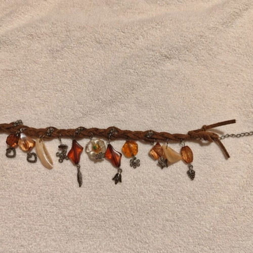 Anklet leather with various earth-tone charms, 27 cm, like new