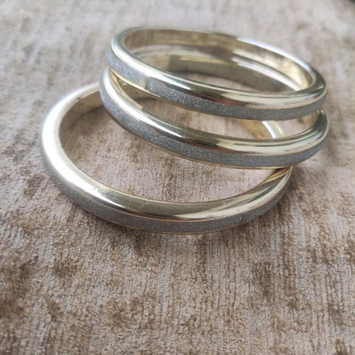Bracelet set used, 3 round gold plastic with silver glitter