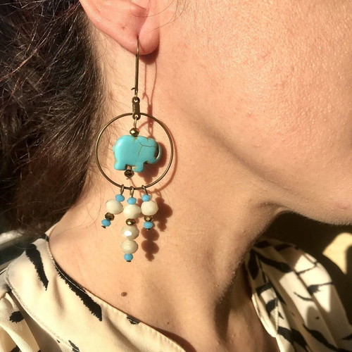 Long bronze hoop earrings with blue elephant chalcedony