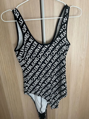 Calvin Klein bodysuit small black like new, elastic cotton