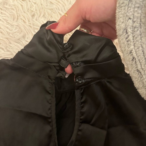 Black satin blouse with 3-D rose design like new