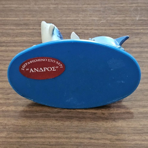 Decorative dolphin pencil holder used