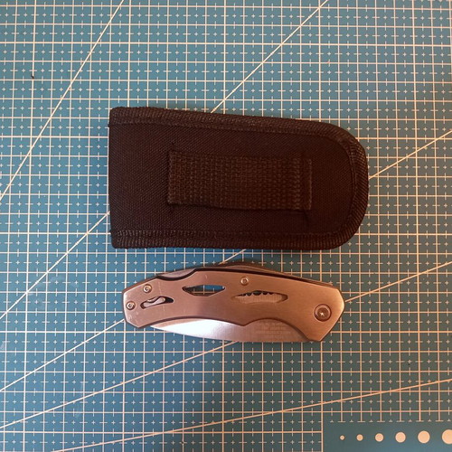 Crivit folding knife with belt sheath, like new