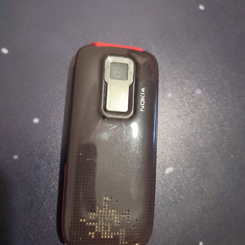 Nokia XpressMusic τηλέφωνο μεταχειρισμένο, σπασμένο τζαμάκι κάμερας, με φορτιστή