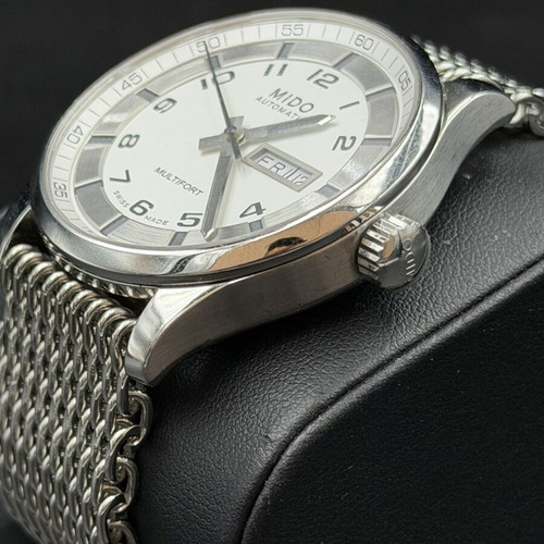 Mido automatic men's watch like new, silver color with box and strap