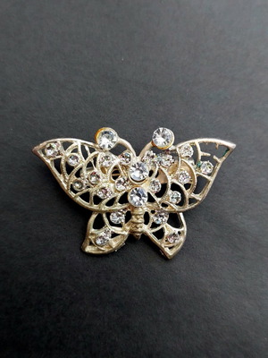Butterfly vintage metal brooch