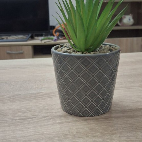 Artificial flower in ceramic pot