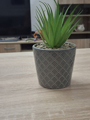 Artificial flower in ceramic pot