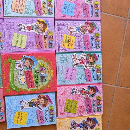 Olivia Secret Notebook like new, set of 13 books