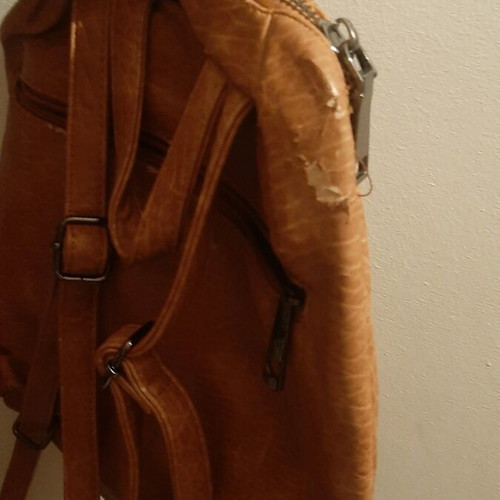 Backpack used with minor scratch on side