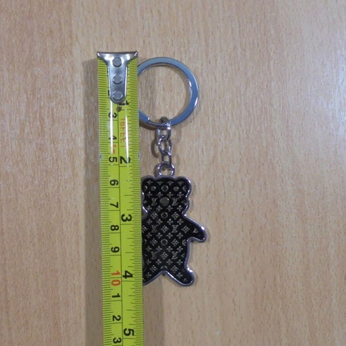 Women's metal keychain with teddy bear like new, black and silver