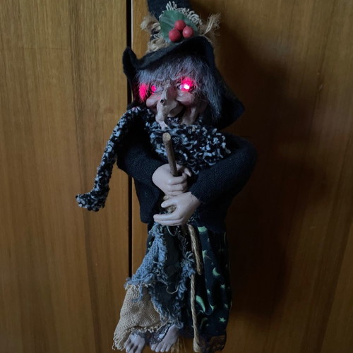 Witch doll new with laughing sound and eye blinking