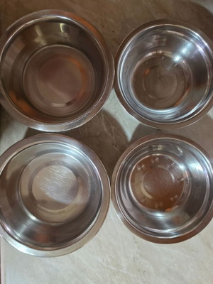 Food and water bowls used, set of 7 ceramic and silver