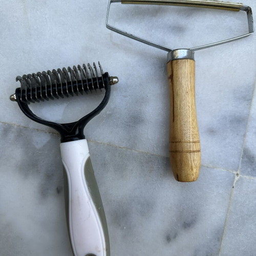 Pet grooming set with mat, glove brush, comb brushes and nail clipper