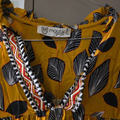 Moutaki dress used, mustard with floral and shape patterns, loose fit