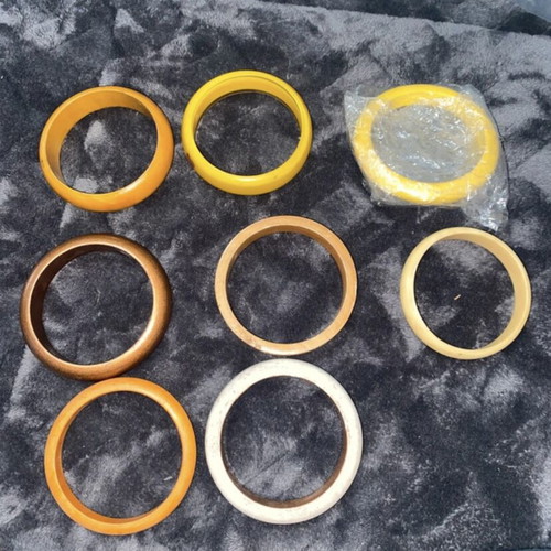 Bracelets new, wooden, plastic and iron multicolor