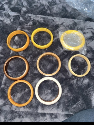 Bracelets new, wooden, plastic and iron multicolor