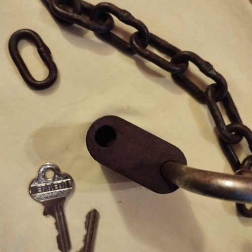 Padlock used with key, chain and skeleton key