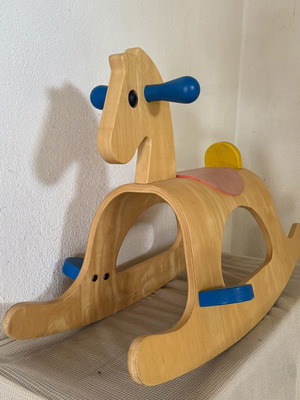 Wooden rocking horse Plantoys carousel ride-on