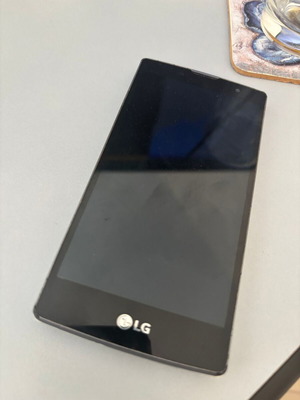 LG G4c H525N smartphone used, fully functional, white, 16GB