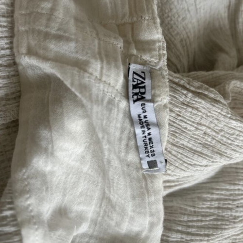white ( greyish ) dress