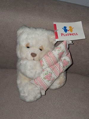 Playwell plush teddy bear with floral pillow like new