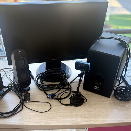 Fujitsu-Siemens computer monitor and Logitech speakers with keyboard and webcam