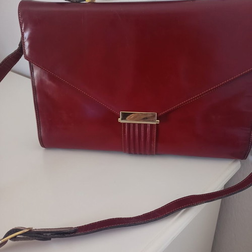 Vintage leather burgundy briefcase with dark green lining used
