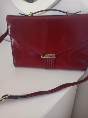 Vintage leather burgundy briefcase with dark green lining used